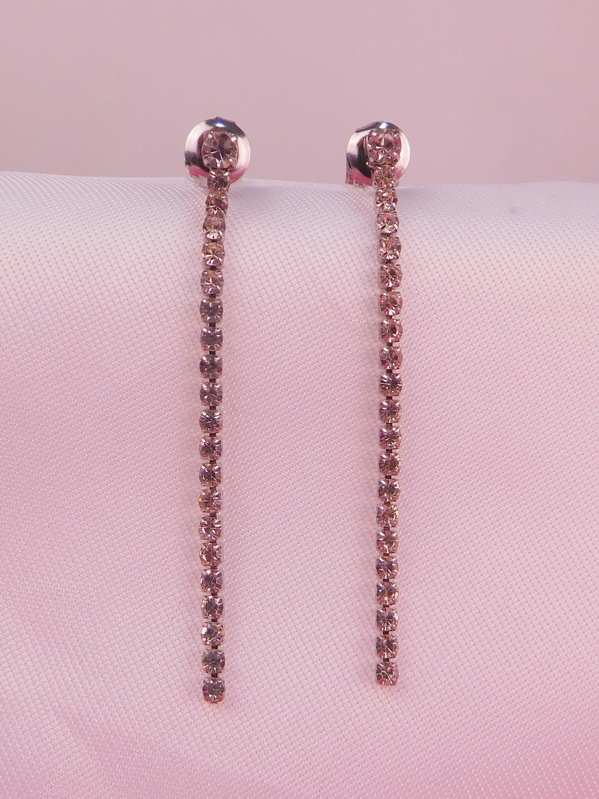 Aretes Hilo de Luz Plateado